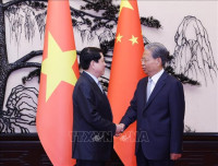 Chủ tịch nước Lương Cường hội kiến Ủy viên trưởng Nhân đại Toàn quốc Trung Quốc Triệu Lạc Tế